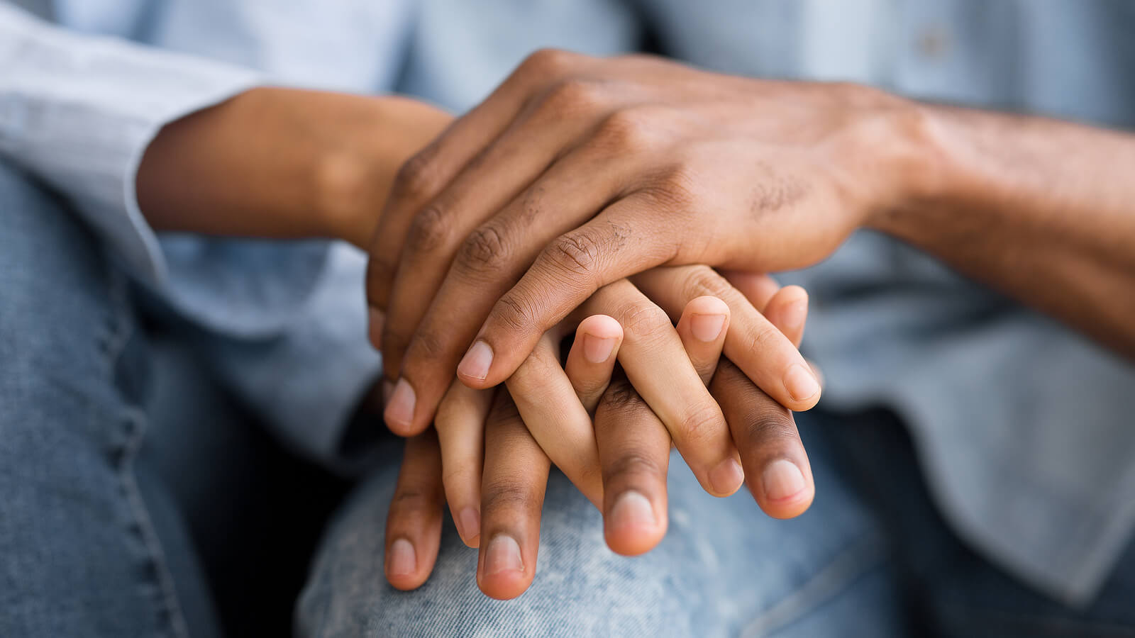 Photo of a couple holding hands. This photo represents how couples therapy in Florida can help you and your partner overcome roadblocks keeping you from having a happy and healthy relationship.