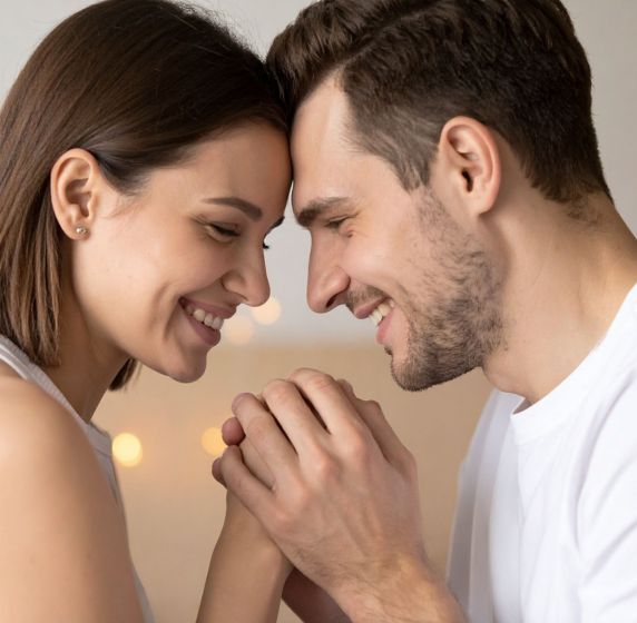 A happy couple looking forward together after healing from infidelity through couples therapy. Can a marriage ever be the same after infidelity? Learn where to start after infidelity with expert help in Miami, Aventura, and Ft. Lauderdale, Florida. Call today to start your recovery journey.