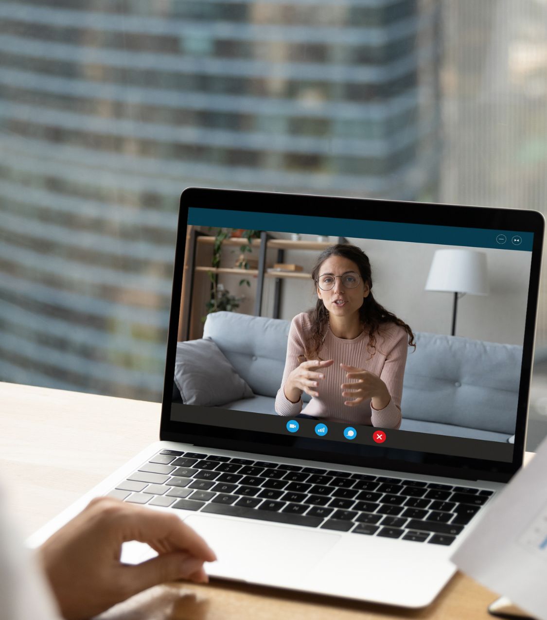 A woman speaks expressively during a video therapy session on a laptop screen, illustrating the clinical advantages of couples therapy online - specialty online therapy that goes beyond convenience and delivers real results. Serving couples in Fort Myers, Delray Beach, and Plantation FL who are asking whether a relationship can grow after cheating. Start your journey with our specialist team today.