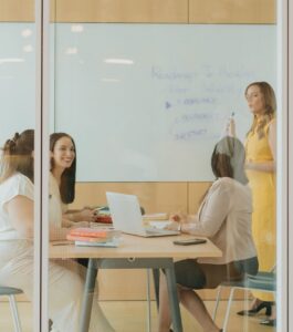 Specialized couples therapist Florida team meeting weekly to consult on cases, with a roadmap to healing on the whiteboard. Serving Tampa, Orlando and Sarasota. Book a consultation with our relationship -trained couples specialists.